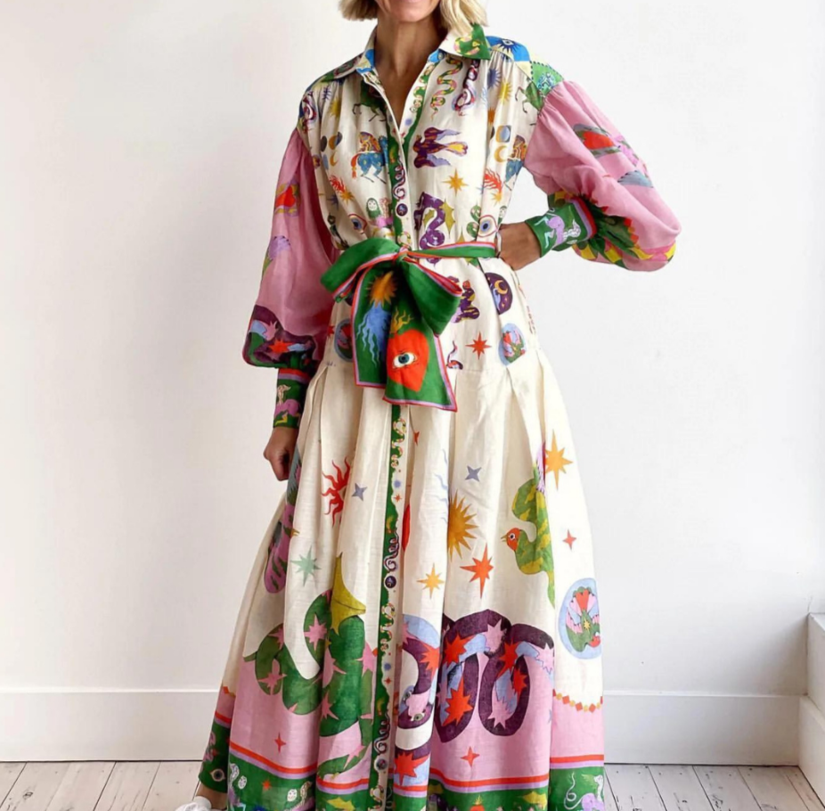Claudia | Volume Dress" can be rewritten as "Claudia | Flowy Volume Dress.